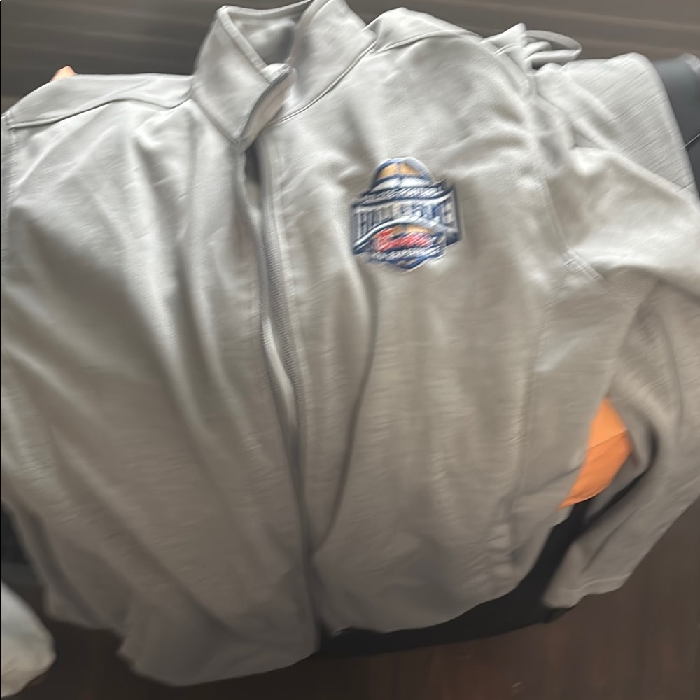 Two Chick Fil A hall of fame College Football and two pull overs